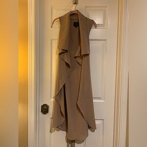 Long sleeveless vest